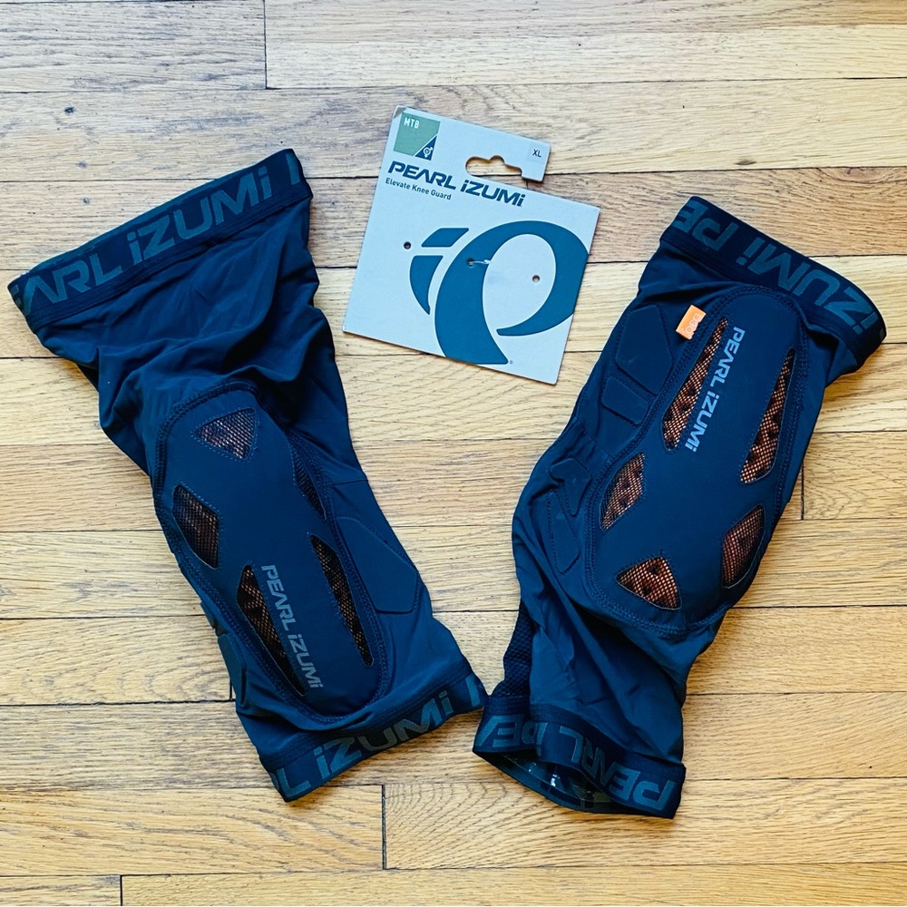 Pearl Izumi Black and Orange Cycling Knee Guards